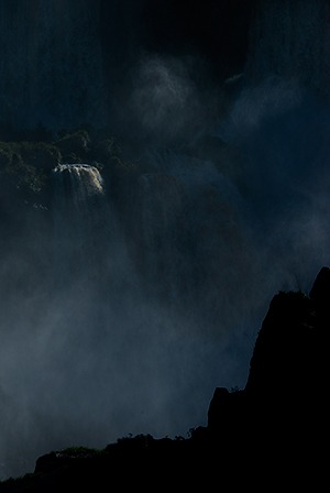 Brink of falls in the mist.  Look carefully and find several other waterfalls!© 2013 Bob Harvey